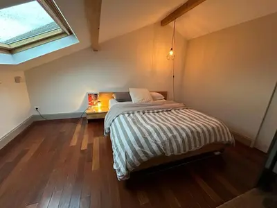 Un ou plusieurs lits dans un hébergement de l'établissement Chambre privée Lyon