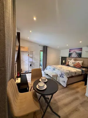 Un ou plusieurs lits dans un hébergement de l'établissement Chalet cosy et coconing