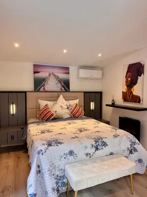 Un ou plusieurs lits dans un hébergement de l'établissement Chalet cosy et coconing