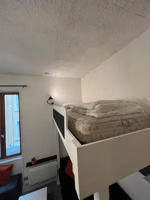 Un ou plusieurs lits dans un hébergement de l'établissement Appartement centre de lyon