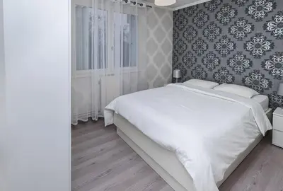 Un ou plusieurs lits dans un hébergement de l'établissement Appartement moderne, proche du Parc de la tête d'Or et de Lyon