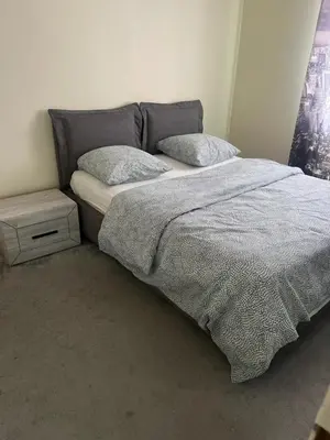Un ou plusieurs lits dans un hébergement de l'établissement Grande maison à Vaulx en Velin Carré de Soie