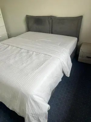 Un ou plusieurs lits dans un hébergement de l'établissement Grande maison à Vaulx en Velin Carré de Soie