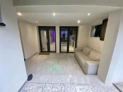 Un ou plusieurs lits dans un hébergement de l'établissement Appartement Lyon dans maison calme