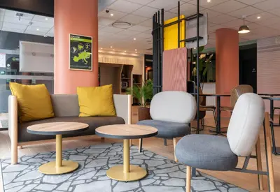 Coin salon dans l'établissement B&B HOTEL Villefranche-sur-Saône Sud