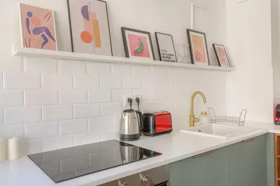 Cuisine ou kitchenette dans l'établissement Design et cosy en hypercentre