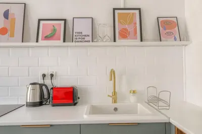 Cuisine ou kitchenette dans l'établissement Design et cosy en hypercentre