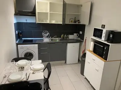 Cuisine ou kitchenette dans l'établissement Jolie perle