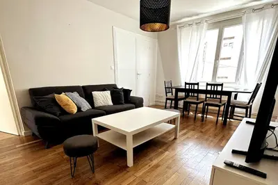 Coin salon dans l'établissement Appartement 6 places, 3 chambres