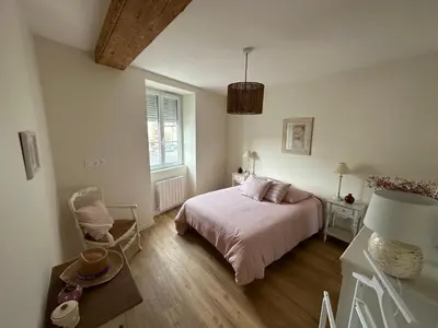 Un ou plusieurs lits dans un hébergement de l'établissement La maison du village