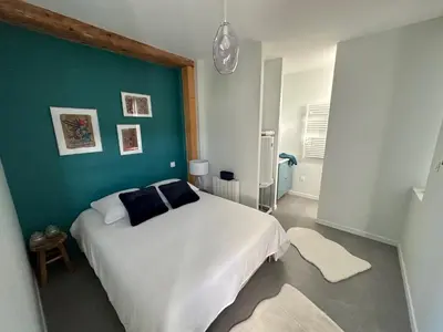 Un ou plusieurs lits dans un hébergement de l'établissement La maison du village