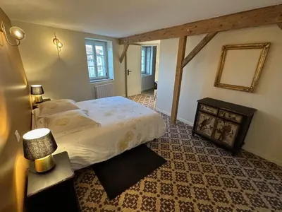 Un ou plusieurs lits dans un hébergement de l'établissement La maison du village