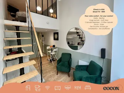 Coin salon dans l'établissement Suite Titouan - Appartement 2 personnes - Check in h24 & Wifi