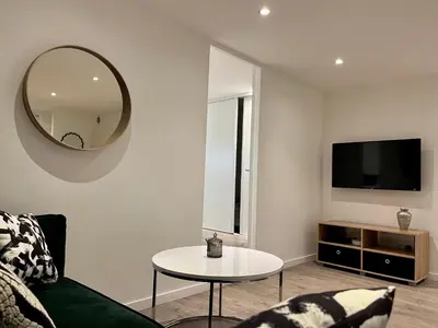Télévision ou salle de divertissement dans l'établissement Suite Maël - Appartement 4 personnes - Check in h24 & Wifi