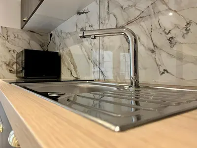 Cuisine ou kitchenette dans l'établissement Suite Maël - Appartement 4 personnes - Check in h24 & Wifi