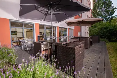 Jardin de l'établissement Apparthotel Privilodges Lyon Lumière