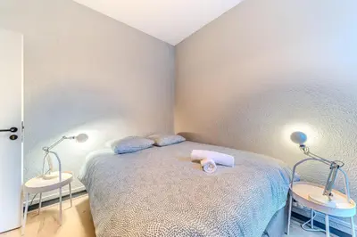 Un ou plusieurs lits dans un hébergement de l'établissement Les Halles - Appartement avec 2 chambre proche de la Part Dieu