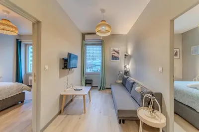 Un ou plusieurs lits dans un hébergement de l'établissement Les Halles - Appartement avec 2 chambre proche de la Part Dieu