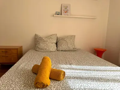 Un ou plusieurs lits dans un hébergement de l'établissement Le tête dOr, BNBConciergerie