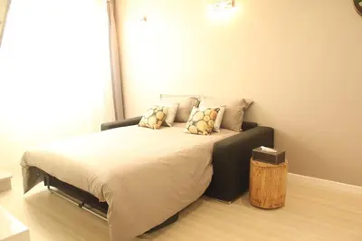 Un ou plusieurs lits dans un hébergement de l'établissement Duplex cosy avec terrasse/Part-Dieu
