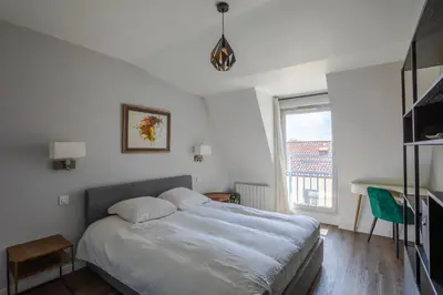 Un ou plusieurs lits dans un hébergement de l'établissement Lyon Premium - Aux Berges du Rhône