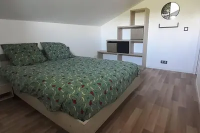 Un ou plusieurs lits dans un hébergement de l'établissement Appartement 60m² -Clonas /Varèze