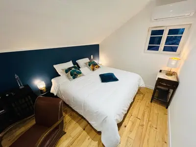 Un ou plusieurs lits dans un hébergement de l'établissement Villa Les Roches d'Yzeron