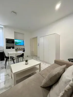 Cuisine ou kitchenette dans l'établissement T2 moderne à 10 min du centre-ville de Lyon