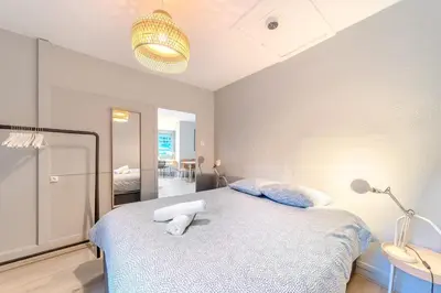 Un ou plusieurs lits dans un hébergement de l'établissement L’Appart des Halles 1 Bedroom Near Part-Dieu