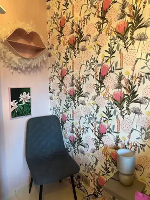 Coin salon dans l'établissement Comme à la maison…