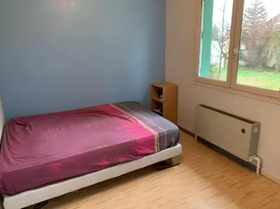 Un ou plusieurs lits dans un hébergement de l'établissement Villa de 3 chambres avec piscine chauffée