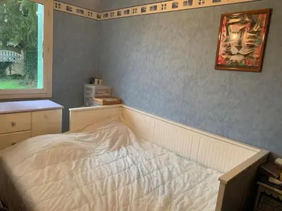 Un ou plusieurs lits dans un hébergement de l'établissement Villa de 3 chambres avec piscine chauffée
