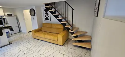 Cuisine ou kitchenette dans l'établissement appartement guy