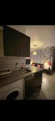 Cuisine ou kitchenette dans l'établissement Belle appartement chaleureux à 2 mn à pied du tramway.