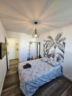 Un ou plusieurs lits dans un hébergement de l'établissement Charmant & spacieux 3 chambres - MM Apartment - Lyon Grand Parilly