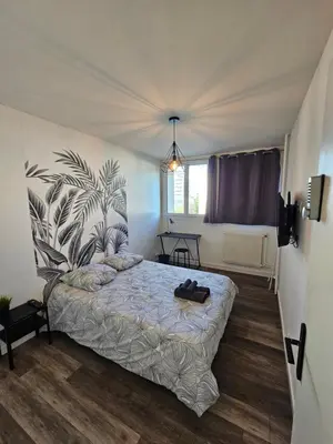 Un ou plusieurs lits dans un hébergement de l'établissement Charmant & spacieux 3 chambres - MM Apartment - Lyon Grand Parilly