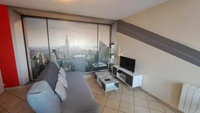 Télévision ou salle de divertissement dans l'établissement Appartement cosy 3 pièces avec garage privatif
