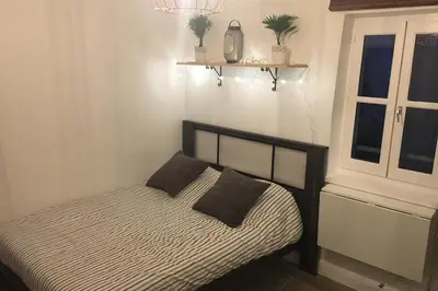 Un ou plusieurs lits dans un hébergement de l'établissement Cozy Studio for 2 People Blandan Sathonay Terreaux