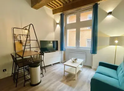 Télévision ou salle de divertissement dans l'établissement Petit Marin Hyper centre