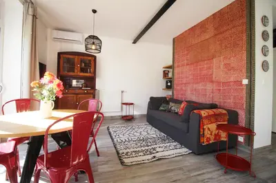 Coin salon dans l'établissement Maison SYRAH