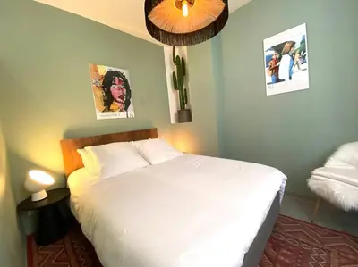 Un ou plusieurs lits dans un hébergement de l'établissement T2 Cocooning au coeur de Vienne