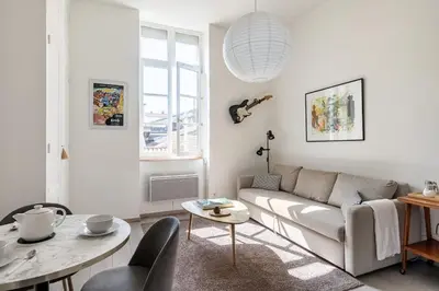 Coin salon dans l'établissement T2 Cocooning au coeur de Vienne