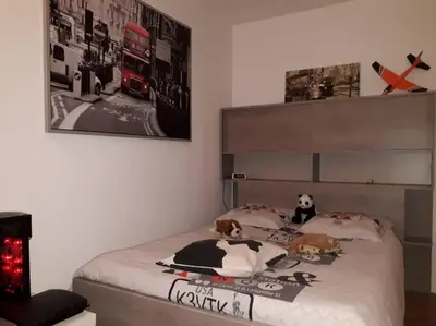 Un ou plusieurs lits dans un hébergement de l'établissement T4/5 avec vue sur les Alpes à 5 minutes de Lyon