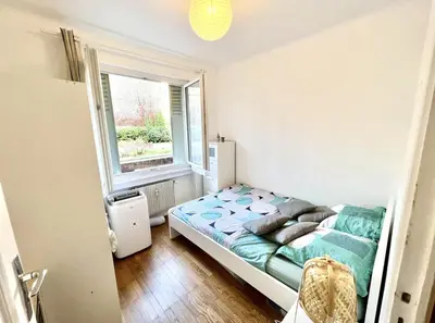 Un ou plusieurs lits dans un hébergement de l'établissement Chambre pour une personne proche de la Gare