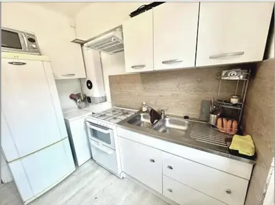 Cuisine ou kitchenette dans l'établissement Chambre pour une personne proche de la Gare