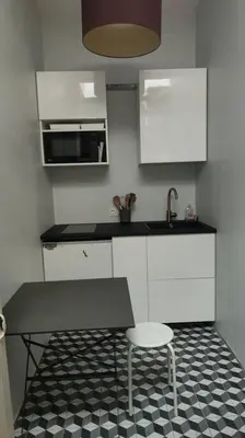 Cuisine ou kitchenette dans l'établissement Joli studio dans maison de maître