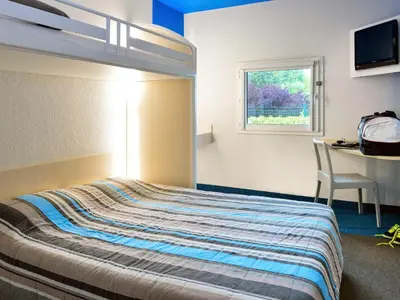 Un ou plusieurs lits dans un hébergement de l'établissement KRYSTAL HOTEL
