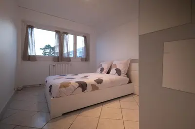 Un ou plusieurs lits dans un hébergement de l'établissement APPARTEMENT ARENA/ GROUPAMA STADIUM/ EUREXPO