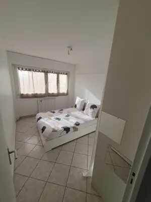 Un ou plusieurs lits dans un hébergement de l'établissement APPARTEMENT ARENA/ GROUPAMA STADIUM/ EUREXPO