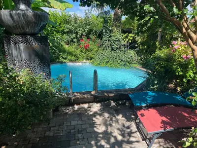Piscine de l'établissement Maison d'Hôtes Comme Chez Vous à 5 mns de Montluel A Proximité de la PLAINE de l'AIN ou située à proximité